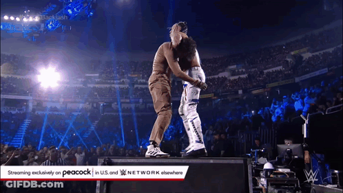 A Wrestling Match Is Being Streamed On Peacock In U.s. And Network Elsewhere GIF