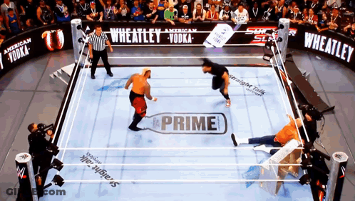 A Wrestling Ring With A Bottle Of Prime In The Middle GIF