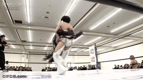 A Wrestling Ring With A Sign That Says Stardom GIF