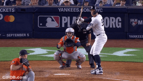 A Yankees Baseball Player Getting Ready To Swing His Bat GIF