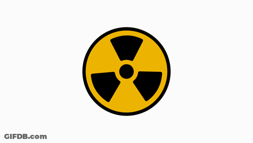 A Yellow And Black Radioactive Symbol With A Black Circle Around It GIF