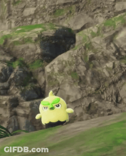 Yellow And Black Stuffed Animal With Green Hat GIF
