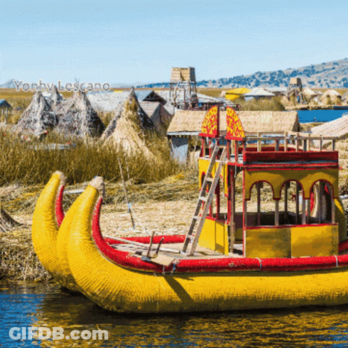 A Yellow And Red Boat With The Word Yonhy Lescano On The Bottom Right GIF