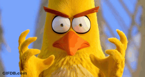 A Yellow Angry Bird With A Red Beak Making A Funny Face GIF