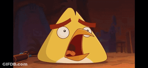 A Yellow Angry Bird With A Surprised Expression On Its Face GIF