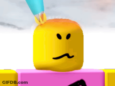 A Yellow Block With A Sad Face Is Being Painted By A Blue Brush GIF