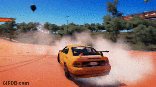 A Yellow Car Driving Down A Dirt Road GIF