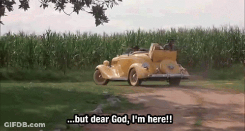 A Yellow Car Is Driving Down A Dirt Road And Says But Dear God I 'M Here ! GIF