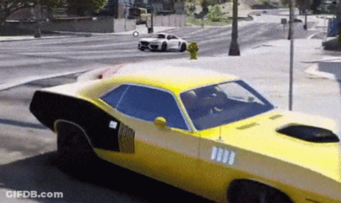 A Yellow Car Is Driving Down A Street With A White Car Behind It GIF