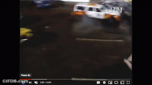 A Yellow Car With A Sticker On The Top That Says ' Ambulance ' GIF