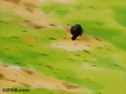 A Yellow Cartoon Character With Red Cheeks Is Laying On The Ground . GIF