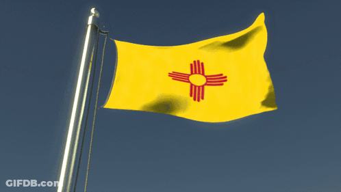A Yellow Flag With A Red And White Cross On It GIF