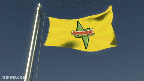 A Yellow Flag With Brawndo On It Is Flying In The Wind GIF