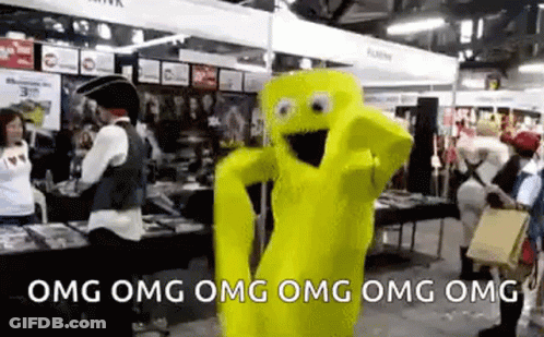 A Yellow Mascot Is Dancing In A Room With People Standing Around . GIF