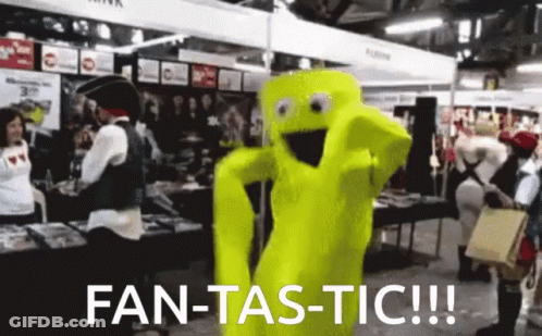 A Yellow Mascot Says Fan-Tas-Tic In Front Of A Crowd Of People GIF