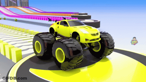 A Yellow Monster Truck Is Driving On A Track With A Sign That Says ' Hot Wheels ' On It GIF