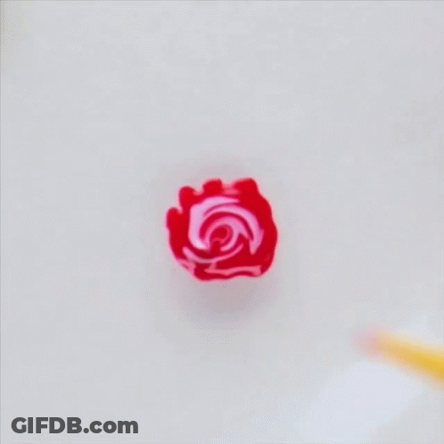 A Yellow Pencil Has A Red Rose On It GIF