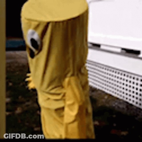 A Yellow Pole With A Hole In It Is Covered In A Yellow Cloth GIF