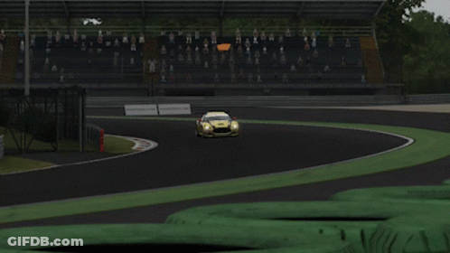 A Yellow Race Car With The Number 55 On The Back GIF