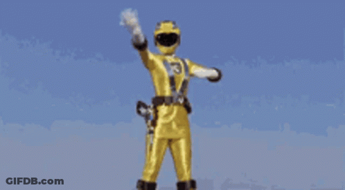 A Yellow Ranger With The Number 3 On His Chest GIF