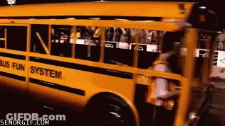 A Yellow School Bus With The Word Bus Fun System On The Side GIF