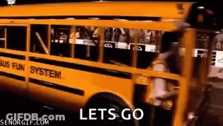 A Yellow School Bus With The Words Let 'S Go On It GIF