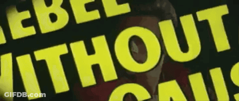 A Yellow Sign That Says Rebel Without Cause On It GIF