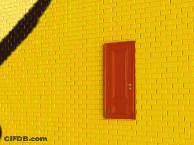 A Yellow Sign With Two Arrows Pointing In Opposite Directions On It GIF