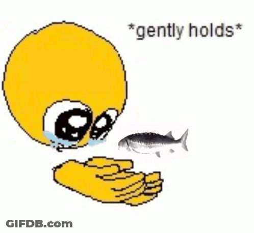 A Yellow Smiley Face Is Crying While Holding A Fish In Its Hands . GIF
