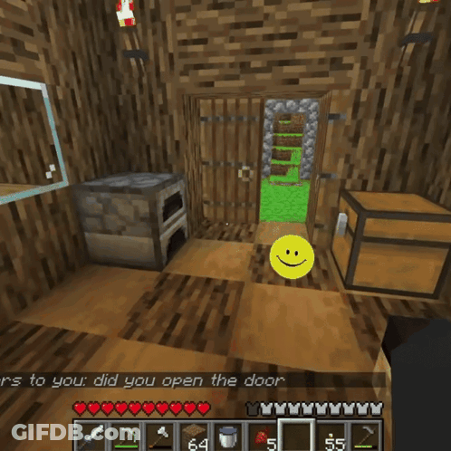 A Yellow Smiley Face Is In Front Of A Wooden Chest GIF