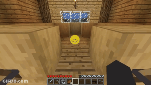 A Yellow Smiley Face Is In The Middle Of A Minecraft Game GIF