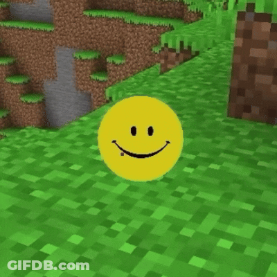 A Yellow Smiley Face Is Standing In The Grass GIF