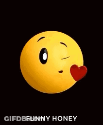 A Yellow Smiley Face With A Red Heart Coming Out Of Its Mouth . GIF