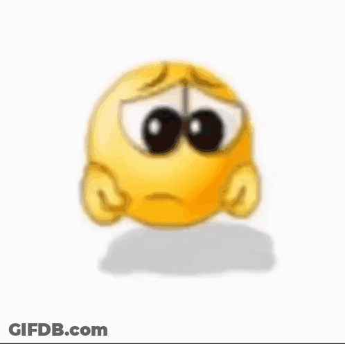 A Yellow Smiley Face With A Sad Look On His Face Is Sitting On The Ground . GIF