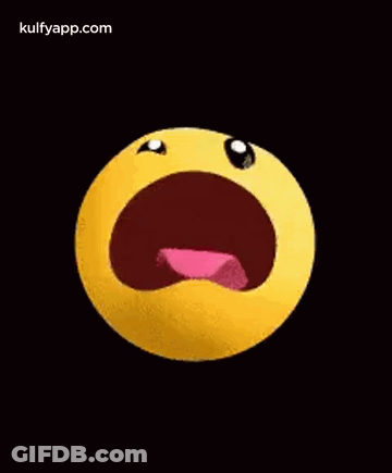 A Yellow Smiley Face With Its Mouth Open And Tongue Sticking Out . GIF