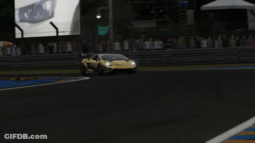 A Yellow Sports Car Is Driving Down A Track GIF