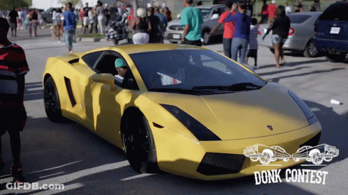 A Yellow Sports Car Is Parked In A Parking Lot With A Donk Contest Logo GIF