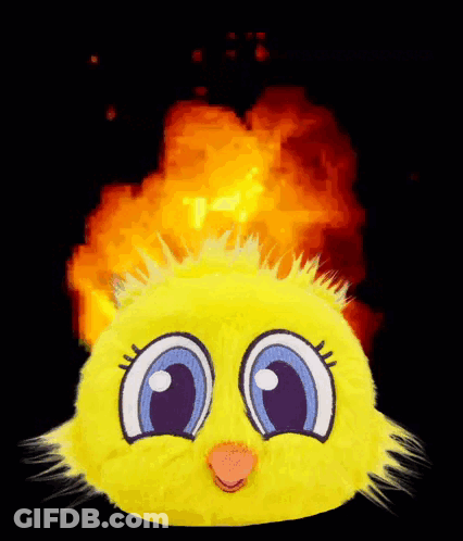 A Yellow Stuffed Animal With Blue Eyes And A Pink Nose Is On Fire GIF