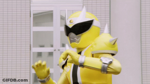 A Yellow Superhero Is Giving The Thumbs Up Sign GIF
