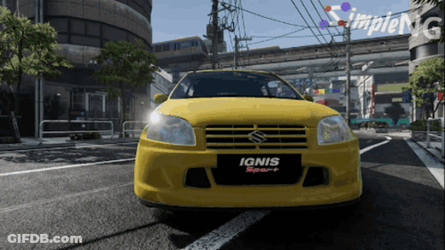 A Yellow Suzuki Ignis Sport Is Parked On A City Street GIF
