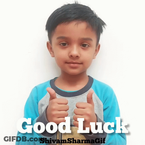 A Young Boy Gives A Thumbs Up With The Words Good Luck Shivam Sharma GIF Behind Him GIF