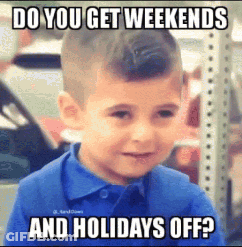 A Young Boy In A Blue Shirt Is Crying With A Meme That Says Do You Get Weekends And Holidays Off ? GIF
