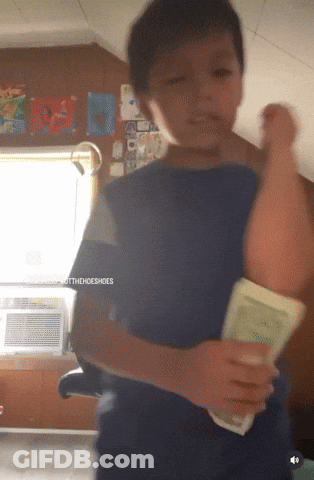 A Young Boy In A Blue Shirt Is Holding A Book In His Hands With The Words Togethershoeshoes Written On The Bottom GIF