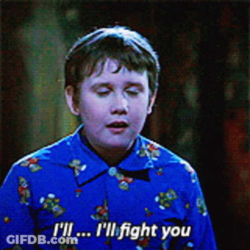 A Young Boy In A Blue Shirt Says " I 'Ll ... I 'Ll Fight You " GIF