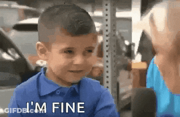 A Young Boy In A Blue Shirt Says " I 'M Fine " GIF
