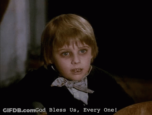 A Young Boy In A Bow Tie Says " God Bless Us " GIF