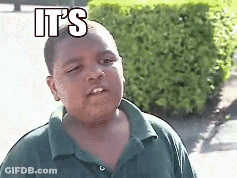A Young Boy In A Green Shirt Is Making A Funny Face With The Words `` It 'S '' Above Him . GIF