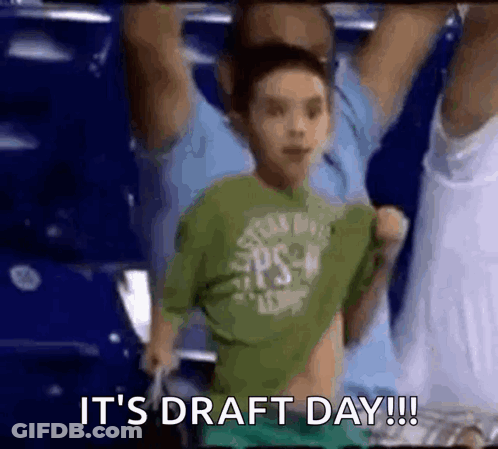 A Young Boy In A Green Shirt Says It 'S Draft Day !! GIF