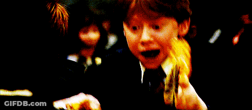 A Young Boy In A Harry Potter Outfit Looks Surprised With His Mouth Open GIF