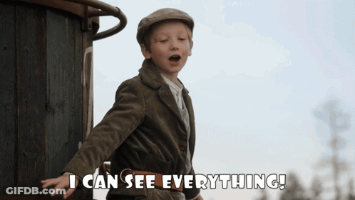 A Young Boy In A Suit And Hat Says I Can See Everything GIF